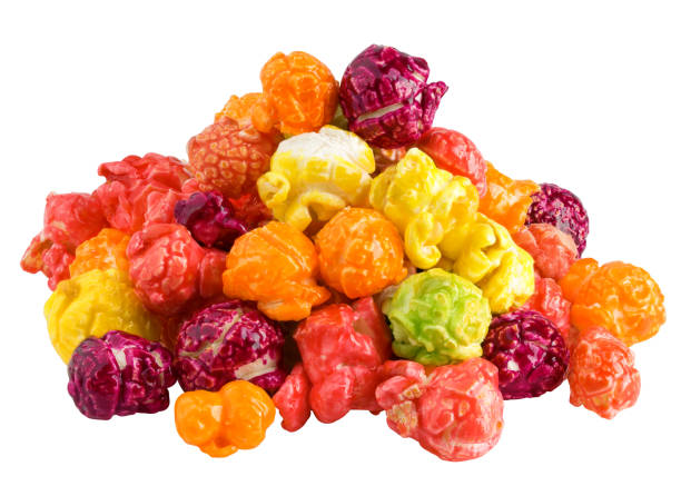 istock Colored fruity popcorn isolated on white background, clipping path, full depth of field 1436516051