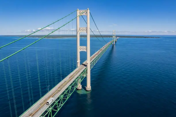 The Mackinac Bridge stretches 5 miles across the Mackinac Straits connecting St. Ignace & Mackinaw City, Michigan.