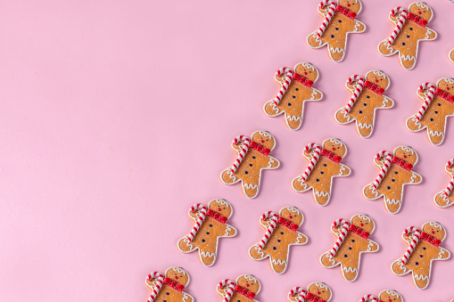 Gingerbread Cookie Ornament on Pink Background With Copy Space