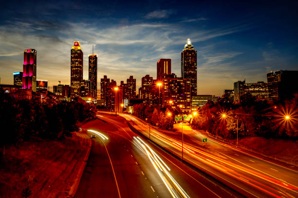 Autumn Sunset City Skyline with light streaking