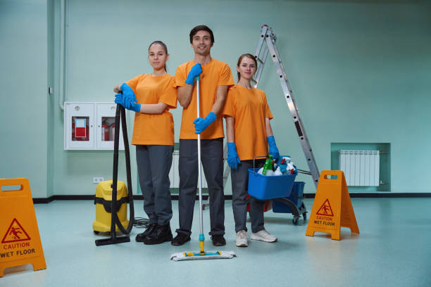 istock Young workers of cleaning company posing with their tools 1436521837