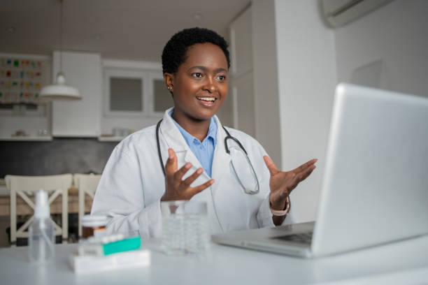 istock Young doctor on a video call with a patient 1436524955