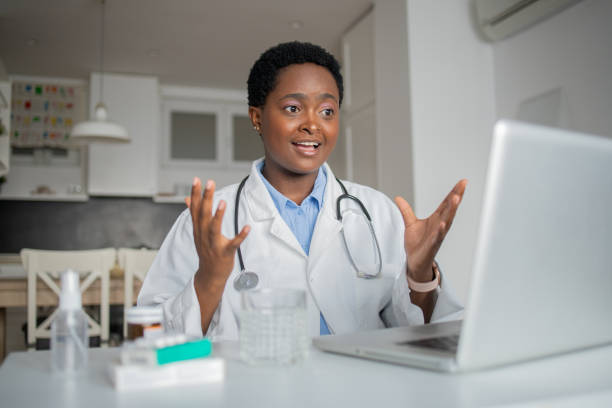 istock Female doctor making video call 1436524960