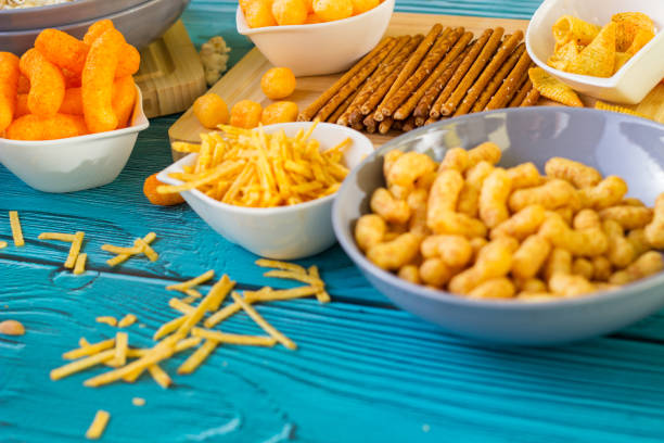 istock Beer salty snacks on wooden table 1436528168