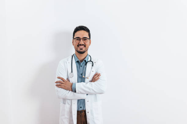 istock Adorable doctor in uniform posing for camera 1436528391