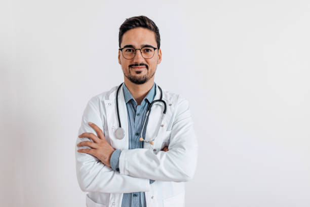 istock Doctor in a lab coat with crossed arms 1436528411