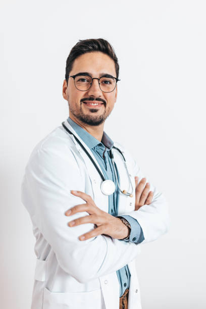 istock Cheerful handsome doctor looking at camera 1436528414