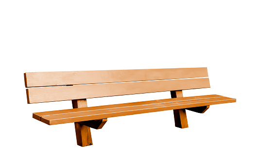 Wooden bench in the city park. Recreation area with empty contemporary wooden benches. Public city resting area design. A wooden bench on concrete floor. City improvement, urban planning, public space