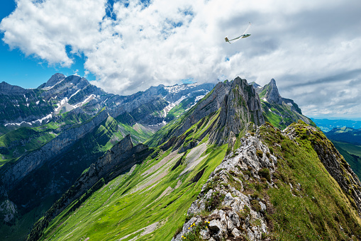 glider over Altenalp Turm in Alpstein area of Switzerland