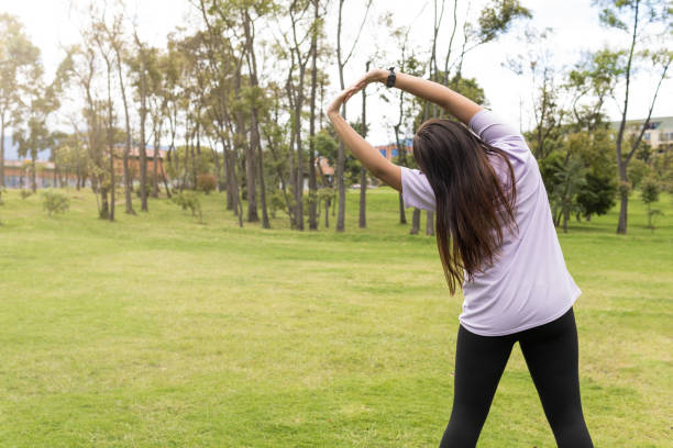 istock young woman stretching her body 1436541391