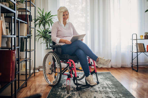 istock Disabled woman at home 1436548864
