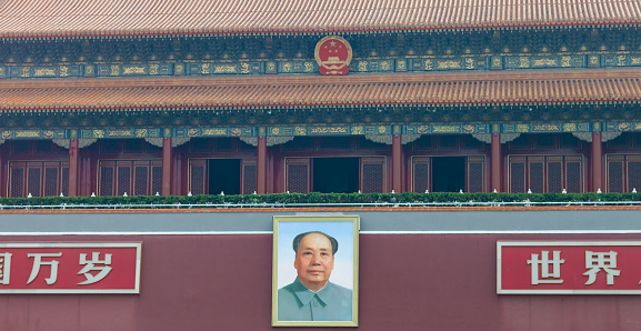 Mao Zedong's portrait hangs over Beijing Tiananmen Gate at the Forbidden City in Beijing, China.