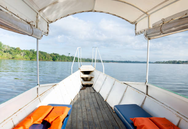 istock Boat sailing around the calm and quiet lake waters 1436557324