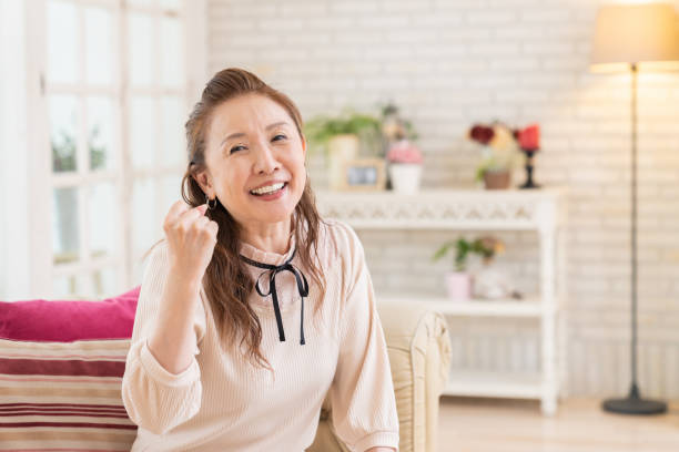 istock senior age woman relaxing 1436560094