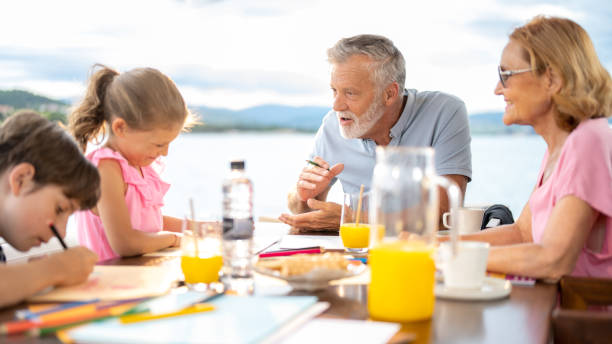 istock Children and grandparents spending time together 1436562631