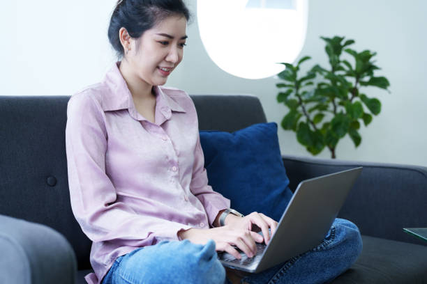 istock Portrait of a self-employed Asian woman using a computer at home 1436563458
