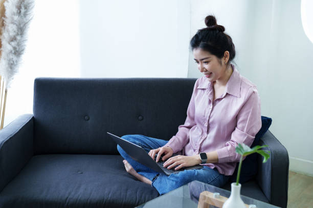istock Portrait of a self-employed Asian woman using a computer at home 1436563534