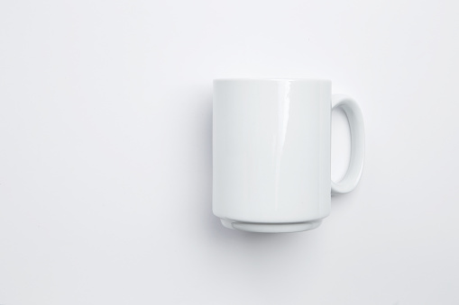 Top view of white color mug isolated on white color background