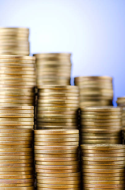 istock Golden coins in high stacks 143656687