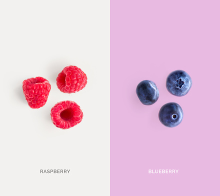 Creative layout made of raspberry and blueberry. Flat lay. Food concept.