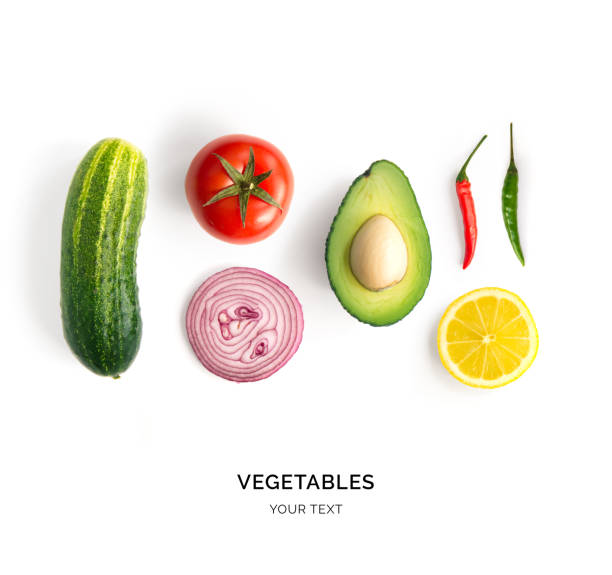 istock Creative layout made of avocado, onion, tomatoes, chilly pepper, cucumber, garlic and lemon. Flat lay. Food concept. Vegetables isolated on white background. 1436572190