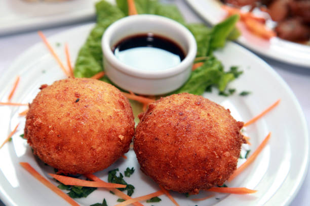istock Potato balls with sauce 1436573995