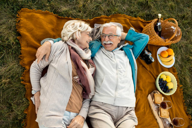 istock Senior couple having a laugh 1436576593