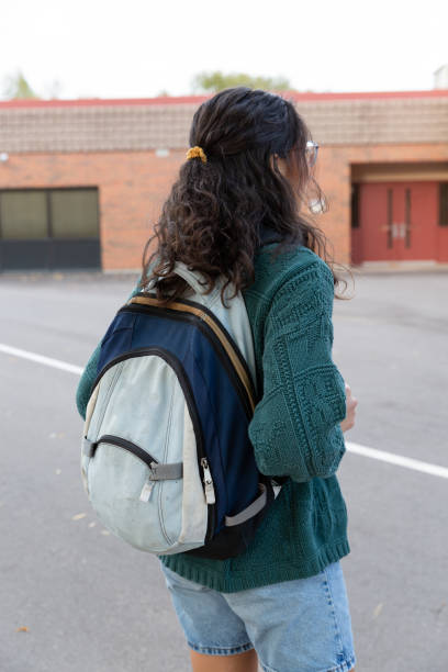 istock College students outside of a school building. 1436578879