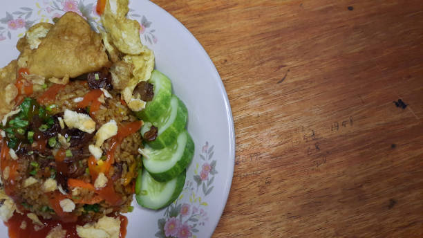 istock Top Angel,  Fried rice Typical Indonesian food which is usually a breakfast and evening menu 02 1436587238
