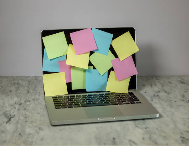istock Work overload concept image or Busy office working lifestyle concept with a sticky notes 1436589620