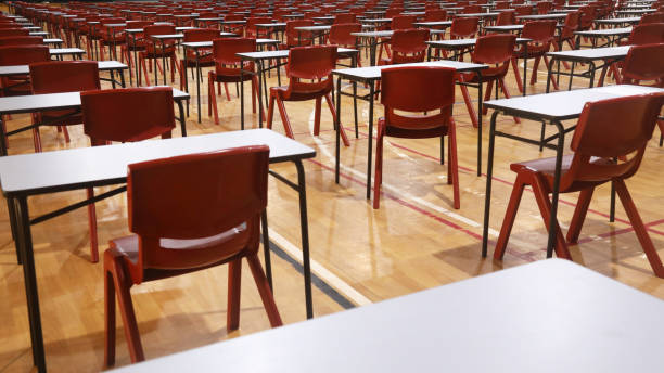 college or school hall set up ready for big exam or tests - baccalaureate imagens e fotografias de stock