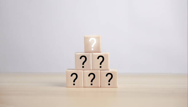 istock A wooden cube block showing a question mark icon. concept alternative thinking, ideas, confusion, Frequently Asked Questions (FAQ), and Business solutions. with copy space 1436593073