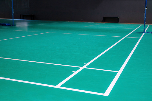 Empty green badminton court for playing