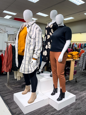 Mannequins wearing Overweight people clothing in a department store