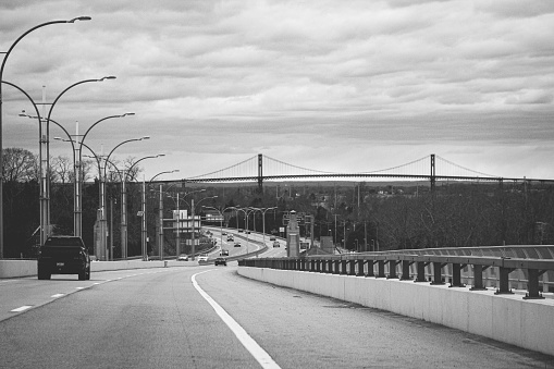 Driving through Rhode Island in the spring of March 29th 2022 on road trip vacation touring around. View of the Mount Hope bridge black and white