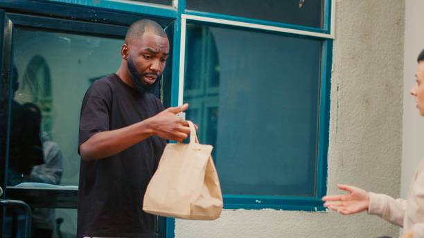 istock Customer receiving wrong food delivery order in paperbag 1436604096