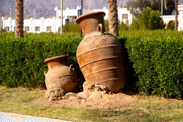 istock broken clay vase lies on the sand 1436611919