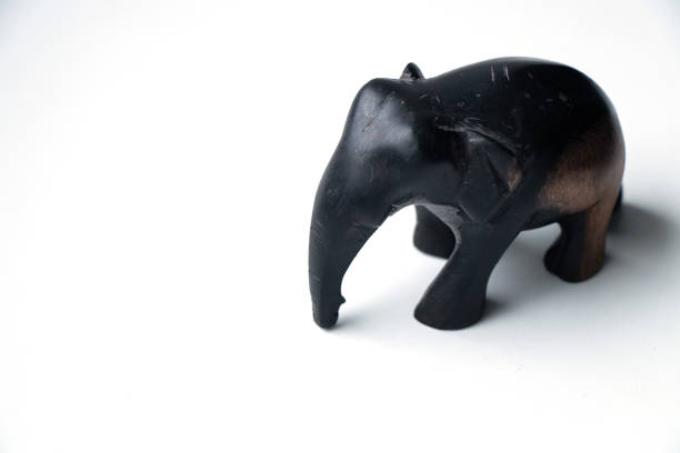 istock handmade stone elephant figurine on an isolated white background 1436612799
