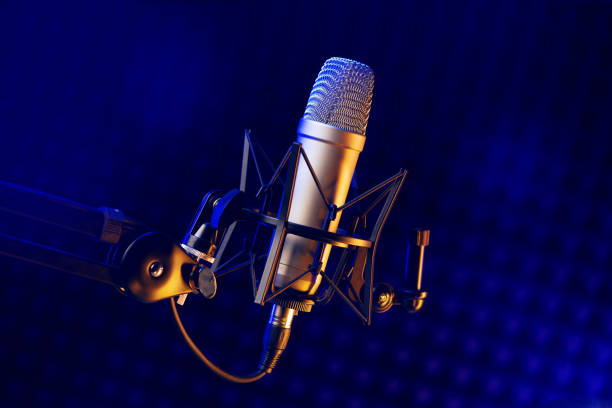 istock Close up of professional microphone in recording studio 1436615049