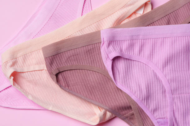 istock Women's panties on pink background with copy space 1436620979