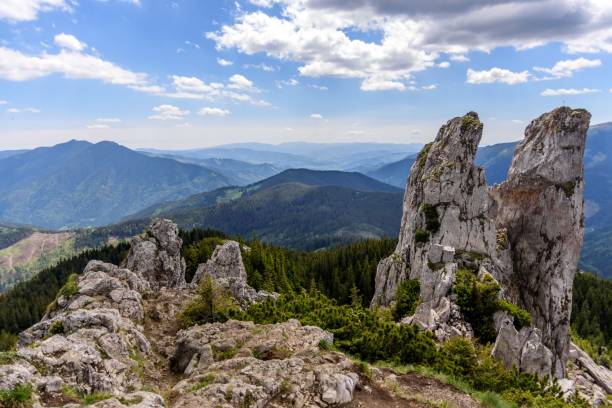 istock Rocky cliff overlooking the mountain landscape 1436623048
