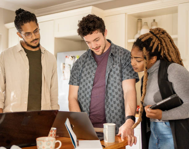 istock Young colleagues working online in their startup's kitchen 1436624200