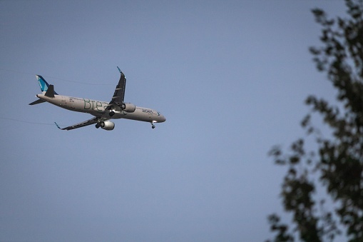 EVERETT, United States – August 27, 2022: A low-angle shot of an Azores Airlines plane approaching Boston
