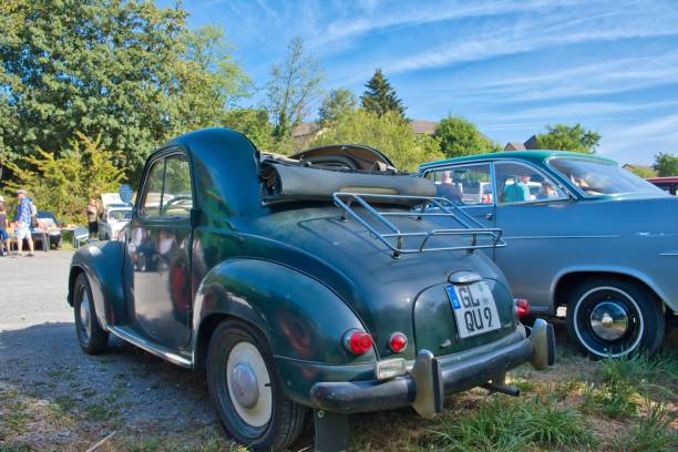 Fiat 500 C Topolino, classic car, Burscheid, Germany – August 21, 2022: Fiat 500 C Topolino, with Americanized front, produced from 1936 - 1955, oldtimer, classic car, diagonal rear view fiat 500 topolino stock pictures, royalty-free photos & images