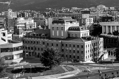Skopje, Macedonia – July 14, 2022: An elevated landscape view of the city of Skopje, capital of North Macedonia. A mixture of architectural styles, Arabic, Neo-Classical, modern.
