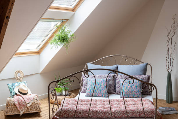 istock Concept decoration : Bedroom under the eaves with natural light and seagrass floor 1436627411