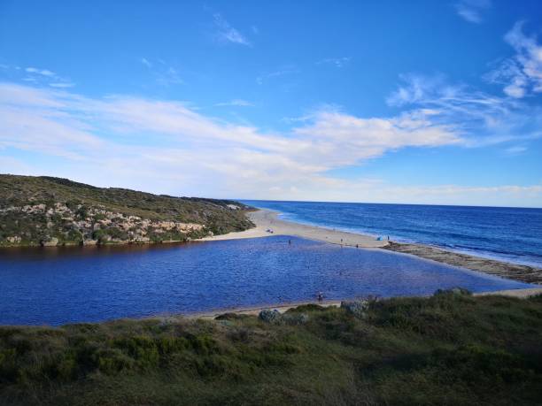 istock Beautiful wavy beach under a sunny sky 1436629187