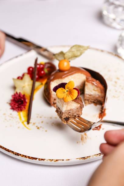 istock Selective focus of a delicious cake with colorful decorations on a fork 1436629565