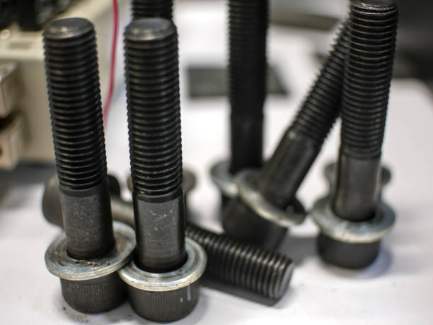 istock Two black steel screws, hexagon socket head, metric thread, with their washer 1436640117