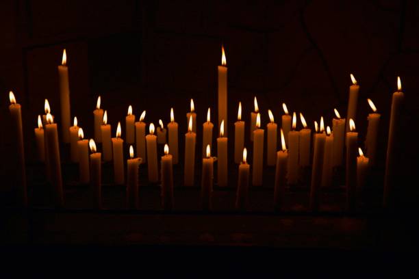 istock Close-Up Of Lit Candles In Temple 1436643839